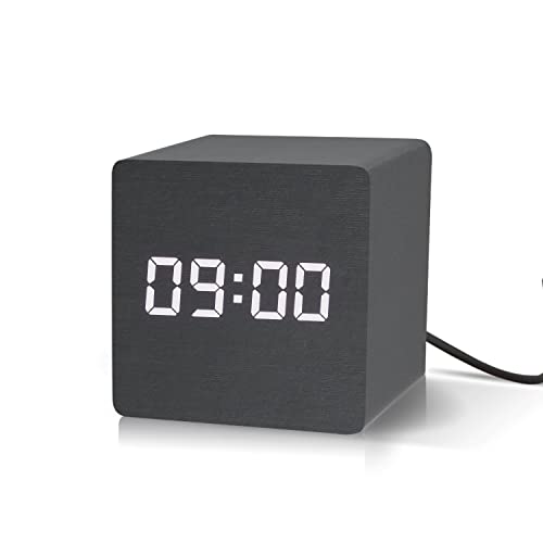 Modern black digital clock with temperature display and unique wooden creation, 6.6W x 6.6H centimeters cube shape with rounded corners.