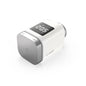 Bosch Smart Home Radiator Thermostat II, a compact intelligent temperature controller designed for customizable heating in each room, compatible with Amazon Alexa, Google Assistant, and Apple HomeKit. Includes 1 thermostat, 2 AA batteries, Danfoss RA and RAVL adapters, and a multilingual quick start guide.