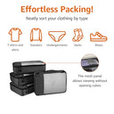 Amazon Basics - Lightweight Packing Cubes Set, Double Zipper, Mesh Top, Durable Polyester, 4 Pieces, Black