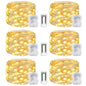 Battery powered string lights in warm white, featuring six packs of twinkle lights with eight modes and a remote control, designed for outdoor use in gardens, bedrooms, parties, and Christmas patio decorations, all waterproof.