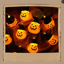Halloween string lights with black hat and pumpkin design for festive decor. Ideal for parties, indoor/outdoor use, and creating a spooky atmosphere.