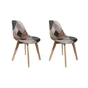 Set of 2 Scandinavian style patchwork chairs with wooden legs and multicolored fabric seats