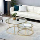 Round nesting coffee table set with gold metal frames and tempered glass tops