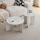 Set of 2 white imitation travertine coffee tables with three-legged design