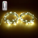 Illuminate your space with Dreamworth's 2 Set 5M 50 LEDs Battery Operated Fairy Lights. Perfect for Christmas, weddings, and parties. Remote control included! Keywords: fairy lights, battery operated, remote control