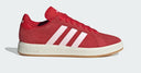 Red leather adidas low-top sneakers with white stripes and sole